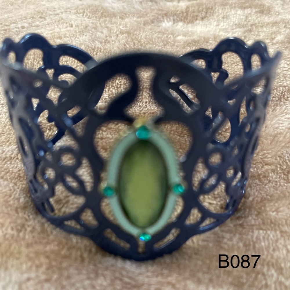Boutique Navy cuffed Bracelet Adjustable with Green medallion open back